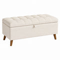 Banc de rangement 120 cm en tissu bouclette crème avec pieds en bois style contemporain